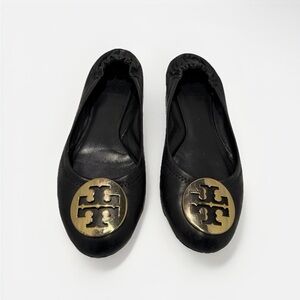 Tory Burch Black Flats with Gold Emblem